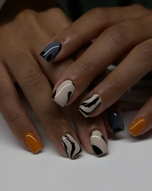 Short square set with black and cream swirls, solid black and burnt orange accents