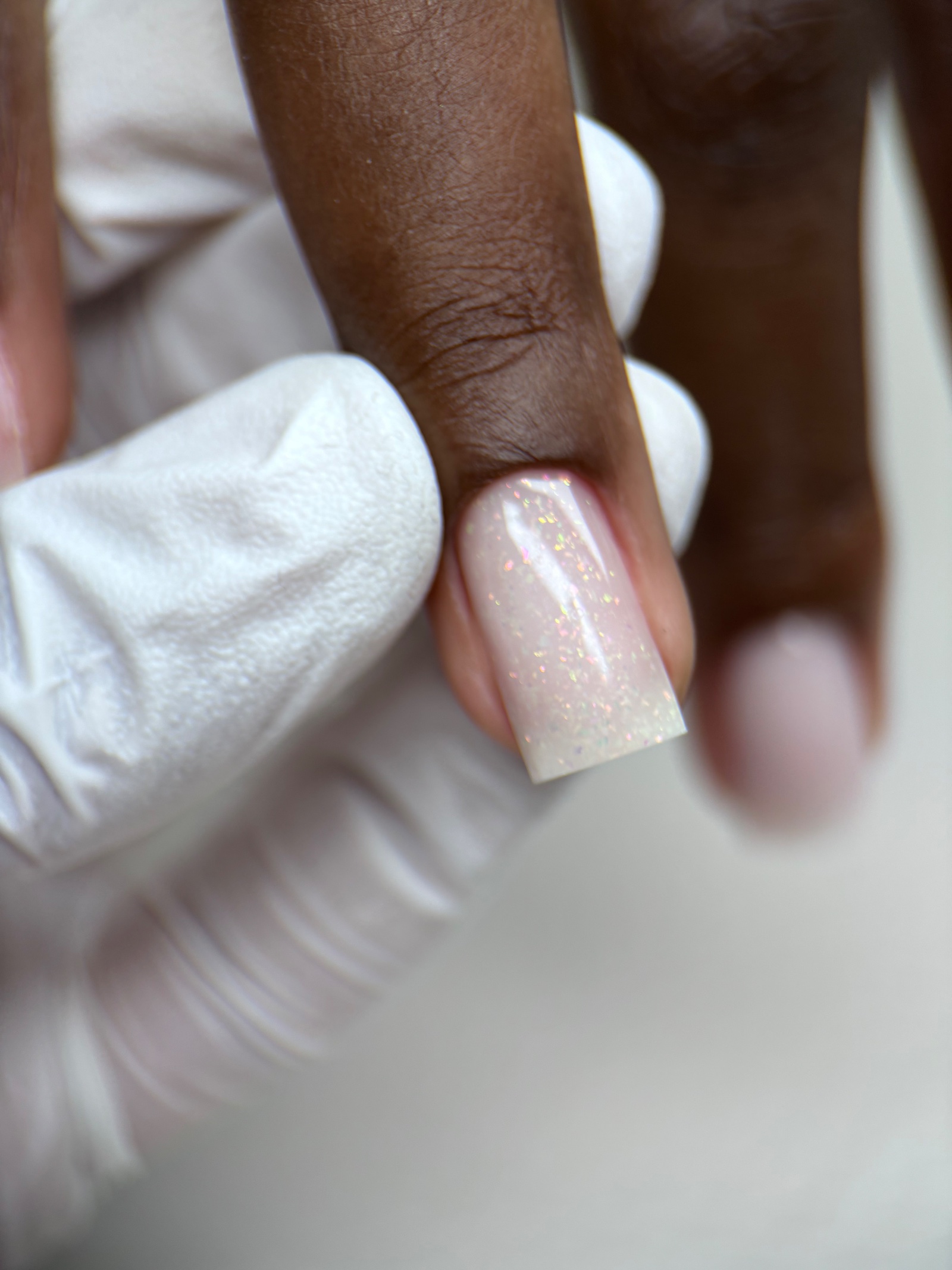Short square structured gel manicure in sheer pink