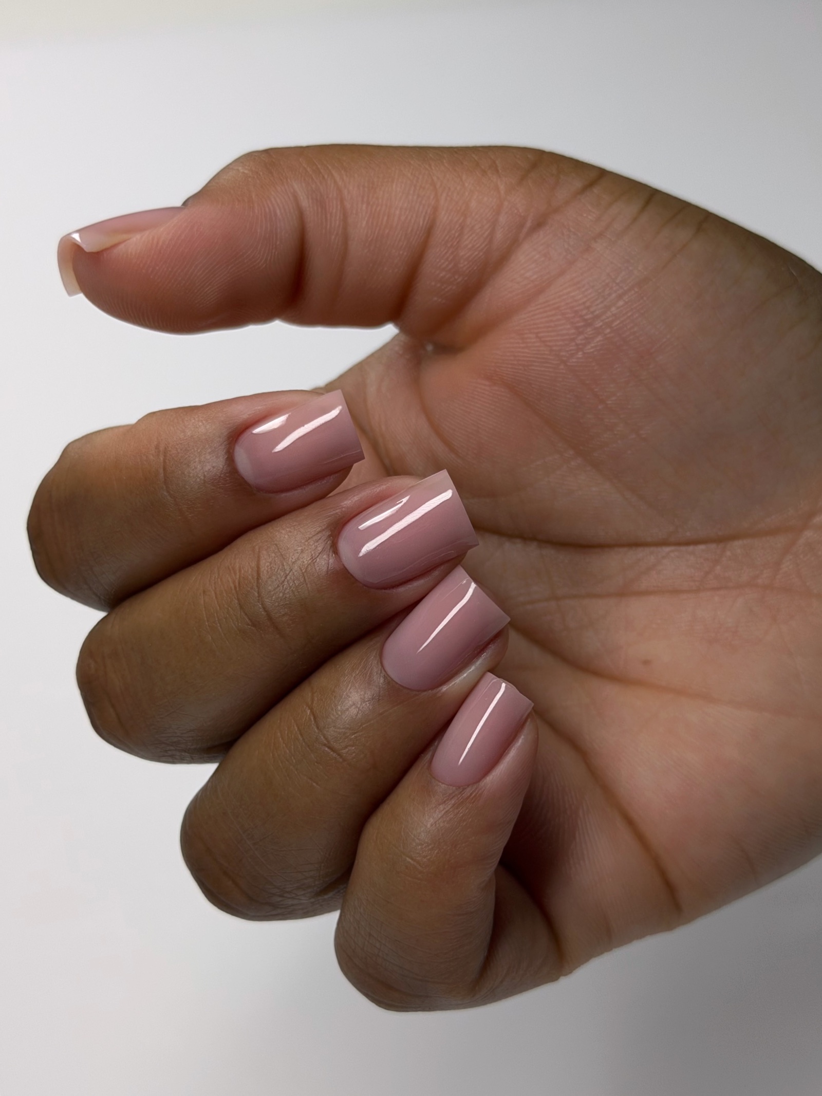 Short square structured gel manicure in sheer pink